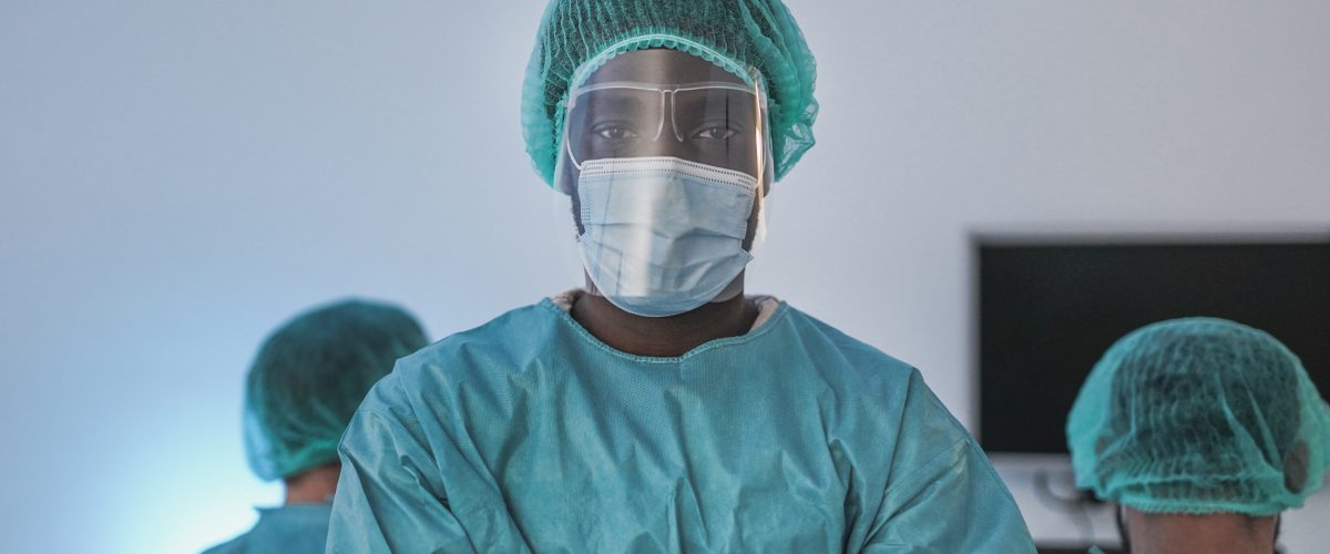 Portrait of african medical doctor inside hospital laboratory